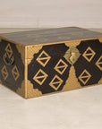 Black lacquered Chinese chest, three-quarter left view