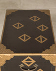 Top view of black lacquered chest with gold decoration