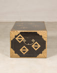 Opposite end view of black lacquered storage chest