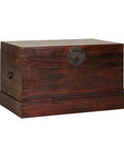 Antique Reddish Brown Lacquered Elm Trunk with Brass Lock and Raised Base