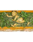 Qing Dynasty Tricolor Roof Fragment from a Temple Depicting a Boy Amidst Leaves