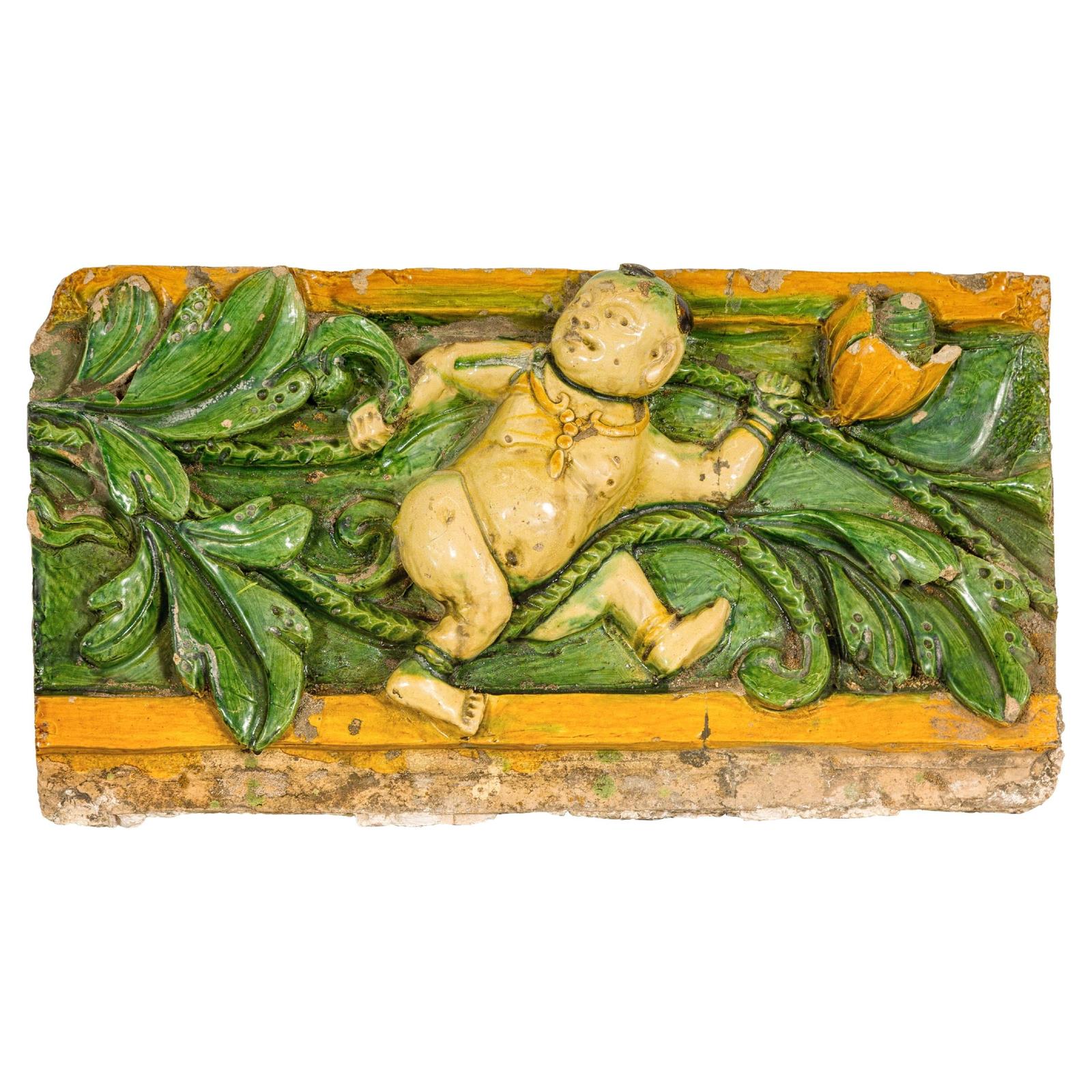 Qing Dynasty Tricolor Raised Relief Roof Fragment from Temple with Boy in Leaves