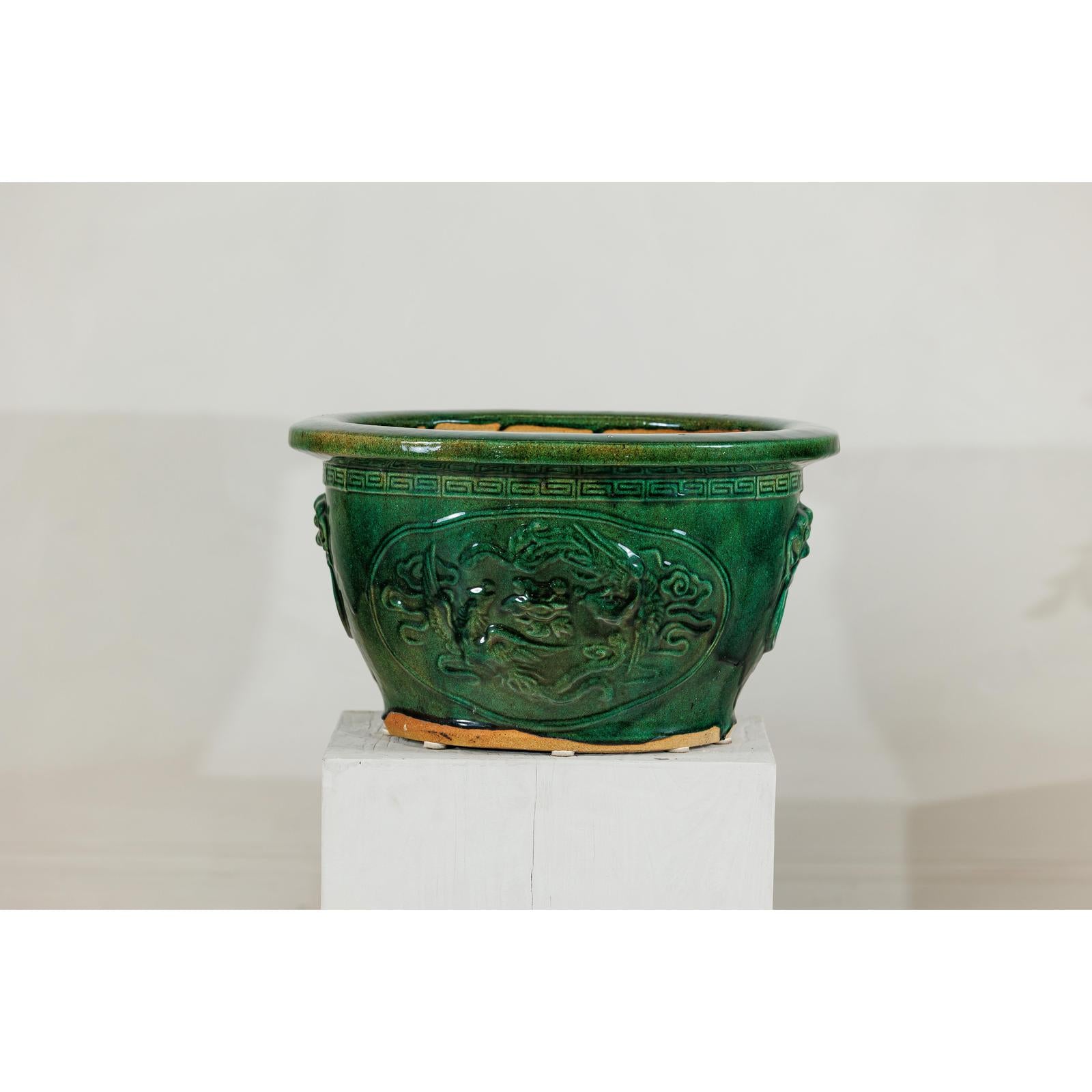 Large Green Planter with Dragon Relief & Decorative Motifs