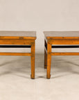 Pair of elm side tables with scalloped aprons, front view