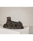 Bronze family of tigers tabletop statue with one adult and two cubs on a base, displayed on a white pedestal.