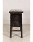 Opposite side view of rustic carved cabinet