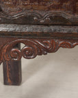 Close-up of carved floral apron