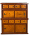 Dark wood Japanese Taishō Mizuya Dansu kitchen cabinet with sliding doors, multiple drawers, and metal handles.