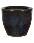 Blue glazed ceramic planter with Shigaraki style wave effects, vintage oversized design, on a white background.