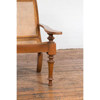 Colonial Cane and Wood Plantation Lounge Chair with Extending Arms