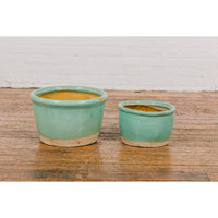 Pair of Ocean Blue Glazed Ceramic Round Nested Planters with Tapering Lines