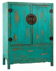 Blue-green lacquered wood Qing Dynasty cabinet with black circular handles and carved apron detail, front view.