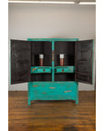Blue-green lacquered wood Qing Dynasty cabinet, carved apron, open doors showing shelves, drawers, brass medallion lock.