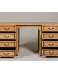 Bleached teak desk with eight drawers, kneehole design, spacious storage on both sides of seat.
