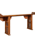 Dark wood Qing Dynasty altar table with bamboo accents, fretwork panels, and everted flanges, front view.