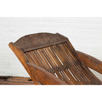 Antique Indonesian Reclining Plantation Chair with Bamboo Slats and Carved Decor