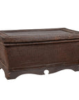 Dark brown rattan antique basket coffee table with lid, early 20th-century style, on neutral background.