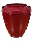Oxblood ceramic water jar with handles and rope design around the top, Thai style, close-up view.