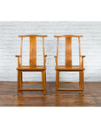 Brown wood Chinese Qing Dynasty 19th century lamp hanger chairs with natural patina side by side on wooden floor.
