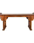 Dark wood Chinese altar console table, Qing Dynasty, 19th c., carved cloudy motifs, curved ends, front view.