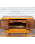 Brown elm wood sideboard with carved spandrels, apron, two doors, and one drawer, Chinese Early 20th Century.