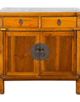 Warm brown elmwood side chest with two drawers and bronze medallion hardware, early 20th century Chinese style.