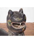 Close-up of a carved polychrome wood mythical guardian animal sculpture from Northern Thailand, Chiang Mai.