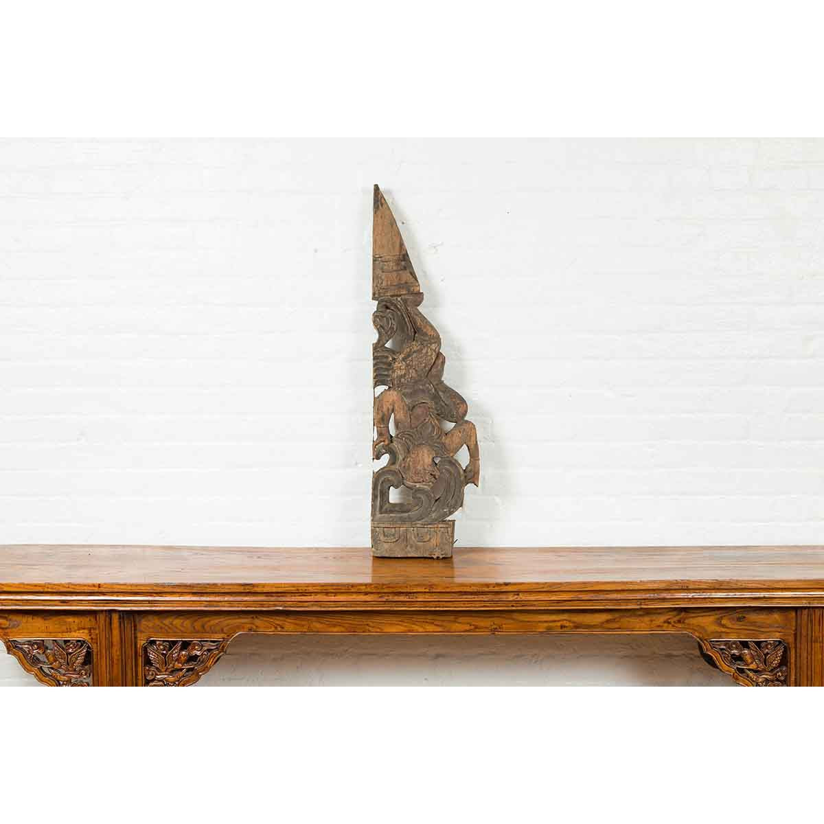 Antique Indonesian Carved Wooden Triangular Fragment Depicting a Falling Figure-8. Asian & Chinese Furniture, Art, Antiques, Vintage Home Décor for sale at FEA Home
