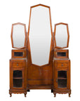 Antique vanity table with octagonal mirrors, marble tabletops, wood cabinets and drawers, decorative carved legs.