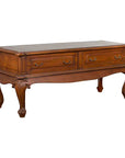 Brown wood Dutch Colonial low table with two drawers and cabriole legs, early 20th-century style, front view.