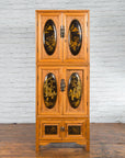 Dark wood Chinese Qing Dynasty cabinet with four chinoiserie panels and two bottom drawers, 19th century.