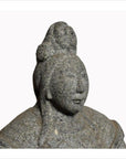 Grey stone hand-carved Chinese guardian sculpture with serene face and elaborate headdress, 19th century.