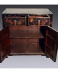 Black antique Chinese Chinoiserie wood cabinet with scalloped hardware, two top drawers, and double doors over empty shelf.