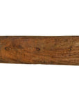 Brown weathered wood plank with three square holes, rustic finish, antique Indian carving.