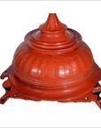 Close-up of red carved wood Burmese offering basket with lid and flared base, 19th century, on white background.