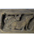 Brown carved wood temple plaque with dog or wolf relief and ornate patterns, 12x4x1 inches, good condition.