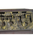 Gold-painted wood Chinese temple plaque with carved figures and trees, detailed wall art, close-up view.