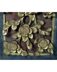 Close-up of gold floral carved antique Chinese wedding bed plaque on red and dark background, 11.5 x 6 x 0.75 inches.