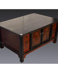 Black lacquer antique Chinese cabinet with floral front panels and short legs, set against a gray background.