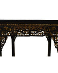 Black lacquer wood altar table with gold and red carved detailing, shown against a white background.