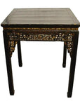 Black lacquered wood Chinese altar table with hand-carved apron and straight legs, full front view.