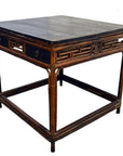 Black lacquered wood Chinese table with drawers, bamboo leg details, antique style, front view.