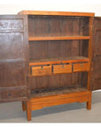 Lacquer brown Chinese wooden cabinet with open doors, interior shelf, and three drawers, front view.