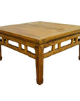 Light brown lacquered wood square Chinese coffee table with sturdy legs and simple carved stretcher details.