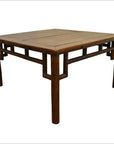 Brown wood Chinese coffee table with square top, bamboo-inspired joinery, natural patina under tabletop.