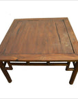 Dark wood Chinese coffee table with square top and bamboo-style joinery on white background.