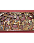 Gold gilt wood panel with ornate hand-carved figures in traditional Chinese dress among trees, painted detail.