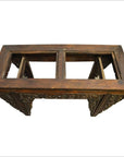 Dark wood hand-carved Chinese console or altar table with ornate details and two open rectangular sections, top view.