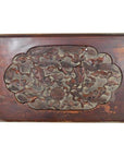 Close-up of antique Chinese lacquered rosewood wall plaque featuring carved birds, clouds, and a plain border.