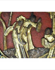 Red wood hand-carved sign with gold relief of three robed figures, red background, antique style.